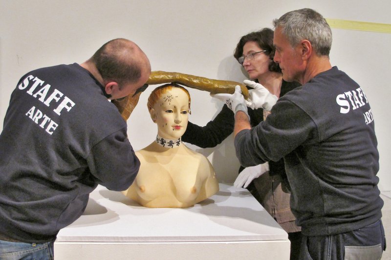 Mail oversees installation of Bust of Woman Retrospective in Rome